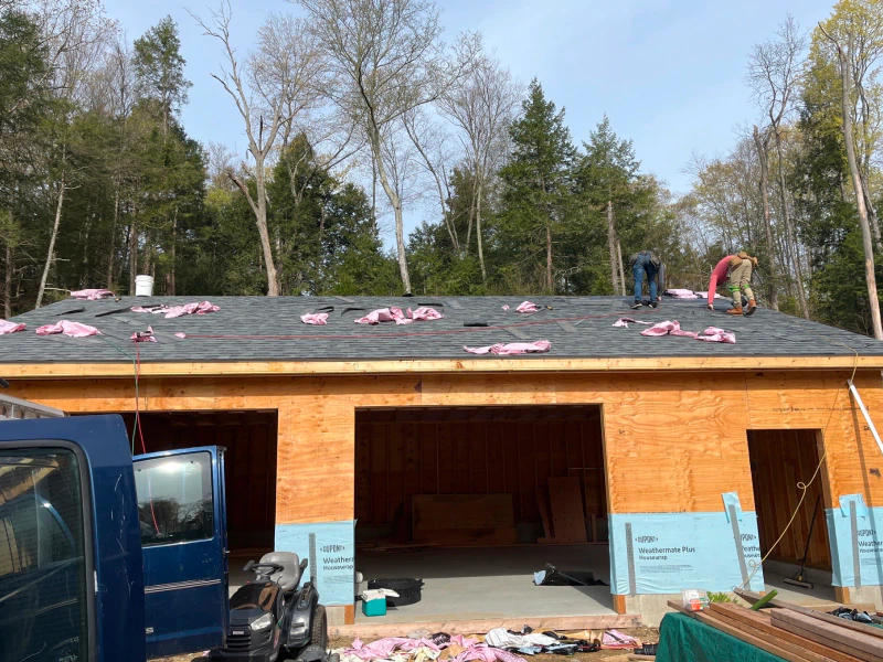 roofers working on a new house build
